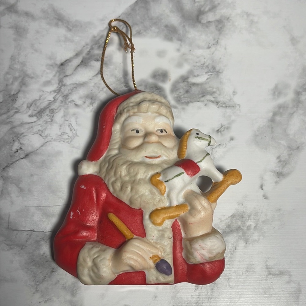 Santa Claus Holding Rocking Horse and Paint Brush Holiday Ornament